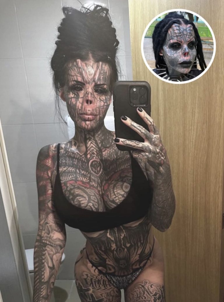 Tattoed woman who keeps her nose in