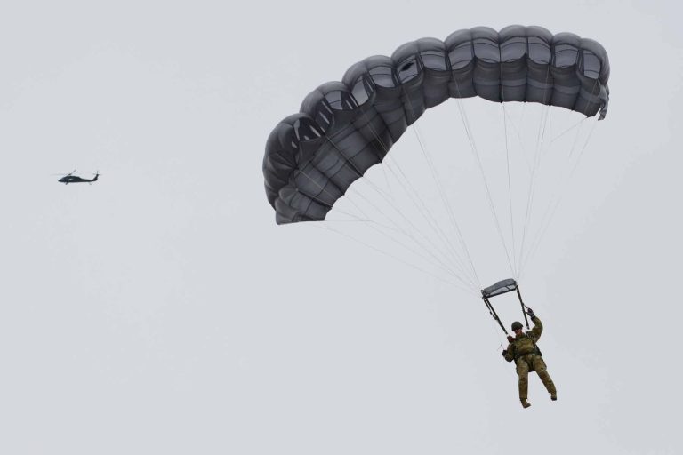 BREAKING NEWS MAN FALL FROM PARACHUTE