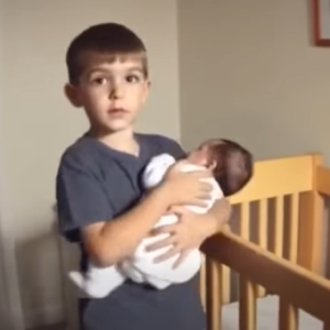 Young parents observed their eldest son